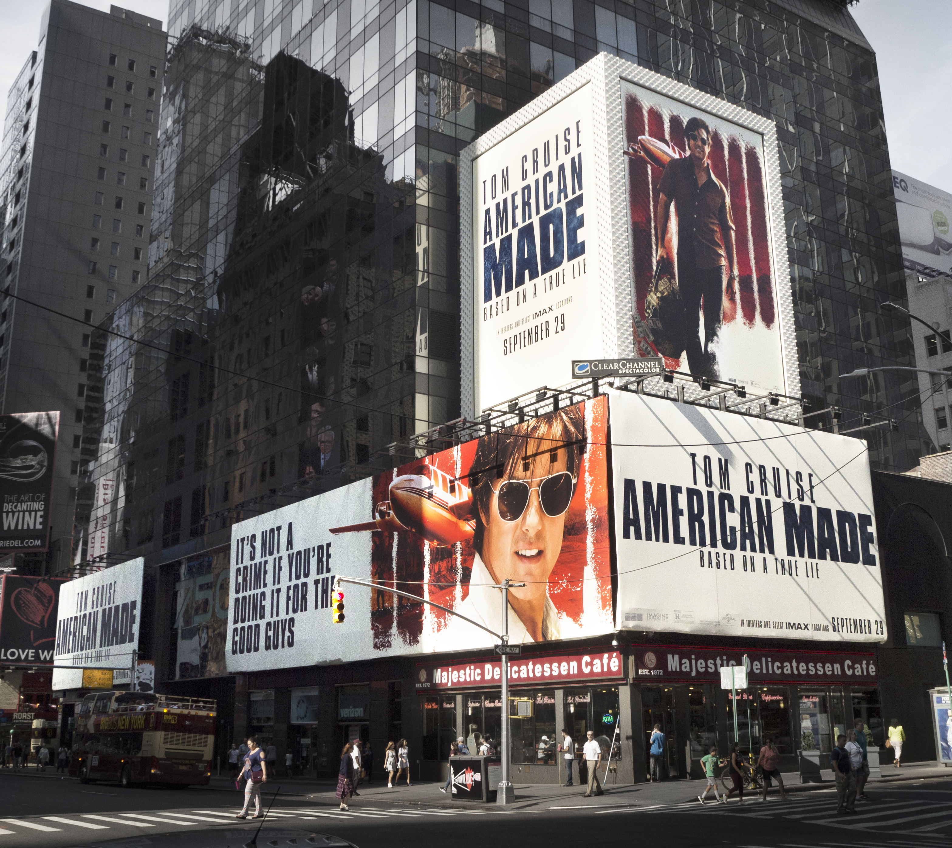 5-panel billboard for American Made posted on the corner of a building